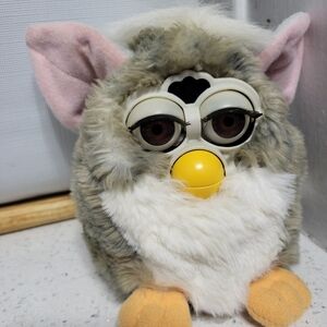 Interactive Plush Toy with Yellow Beak